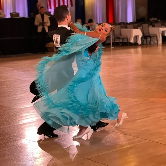 Elegant Blue Feathered Ballroom Dress - Picture 1 of 6